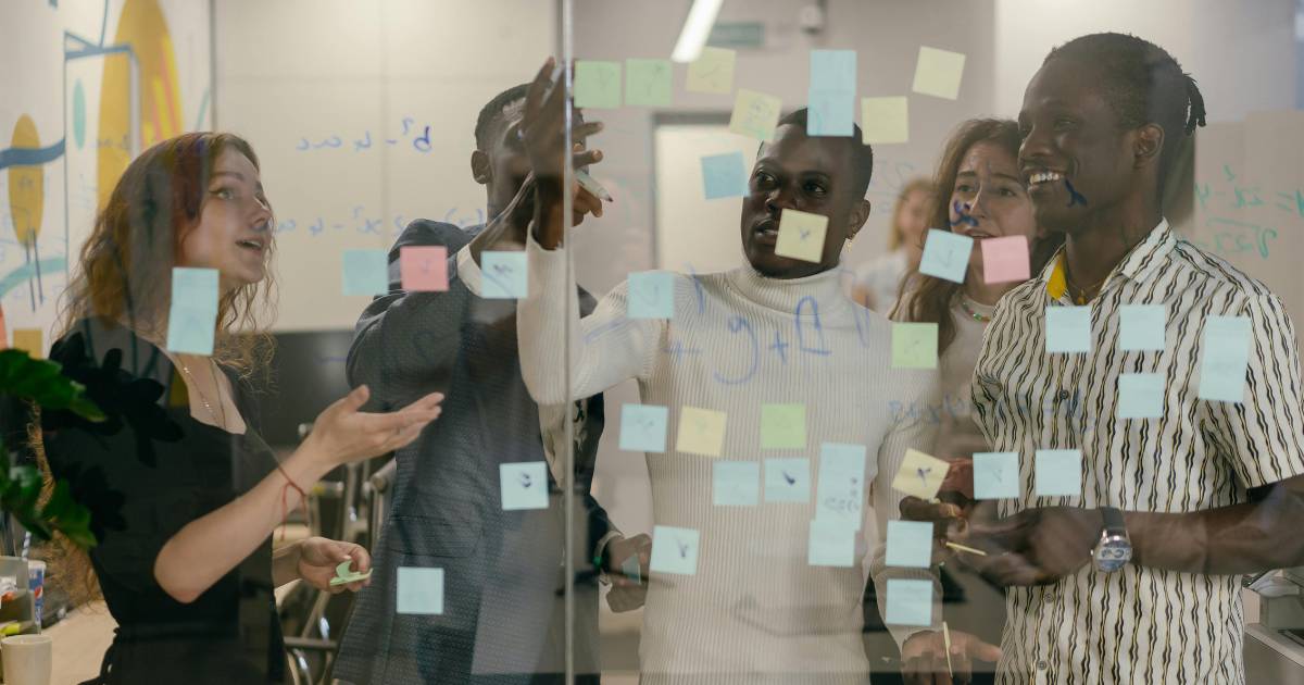 A product team reviewing continuous discovery research findings from customers.