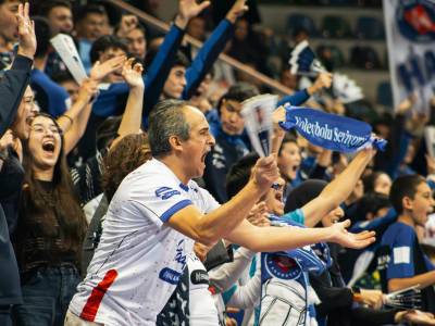 Excited sports fans cheering in Ankara stadium