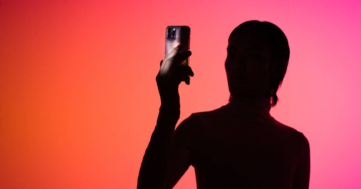 Holo AI Silhouette of Person with Smartphone.