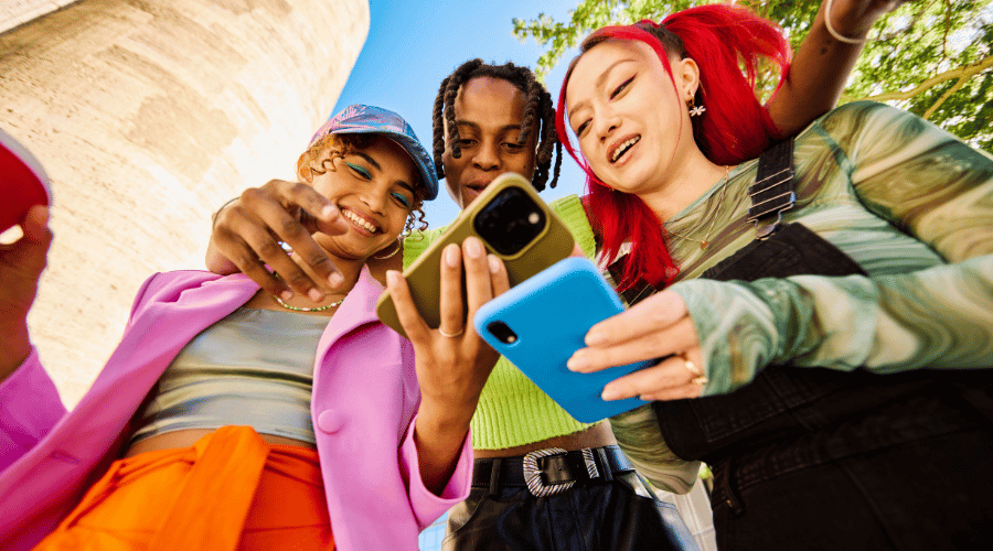 Friends using phones together