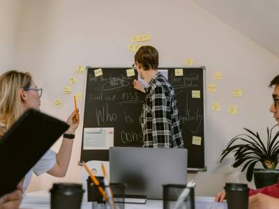 A Group of People Having a Meeting in the Office.