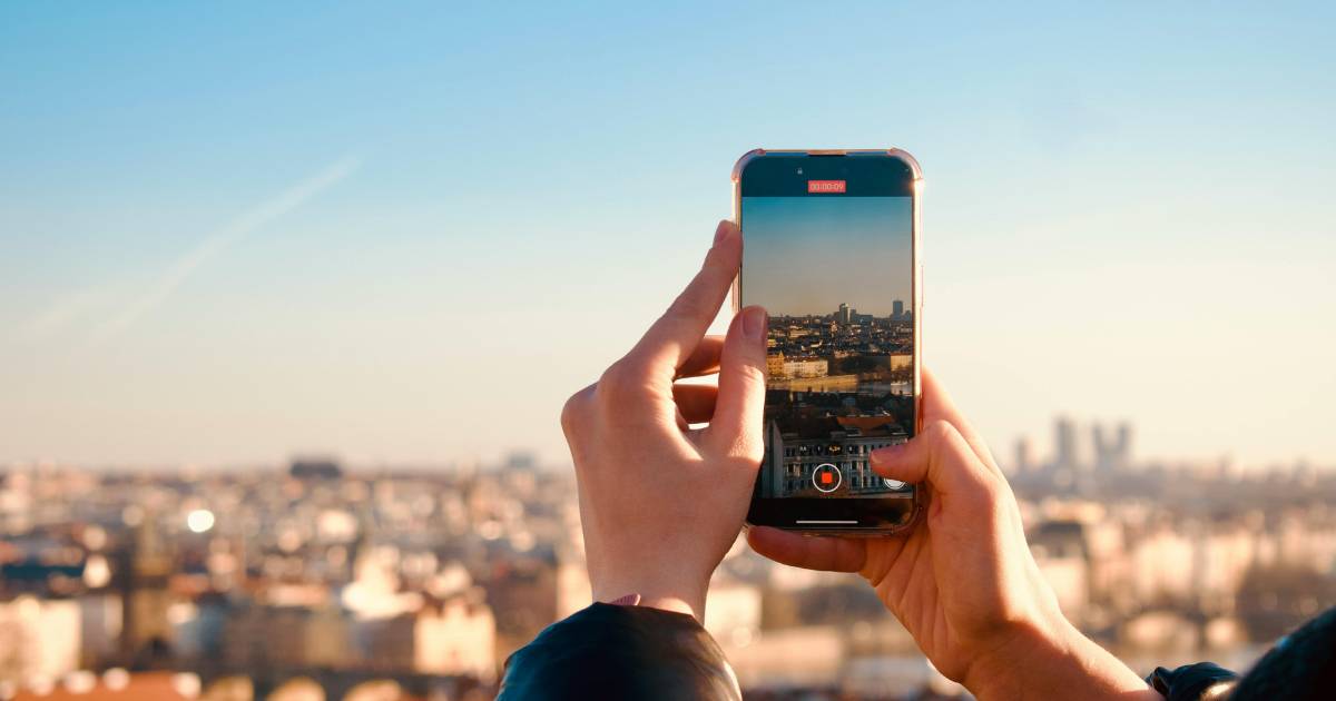 Capturing City Skyline with Smartphone at Sunset
