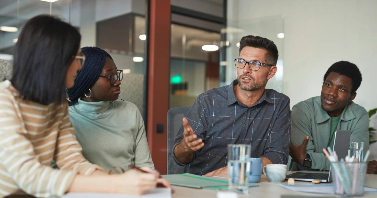 A Group of People Having a Meeting in the Office.