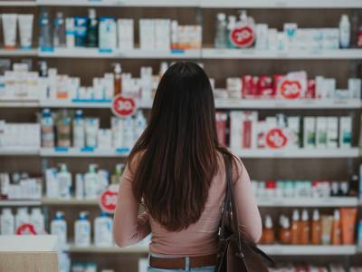 Woman browsing a shelf 