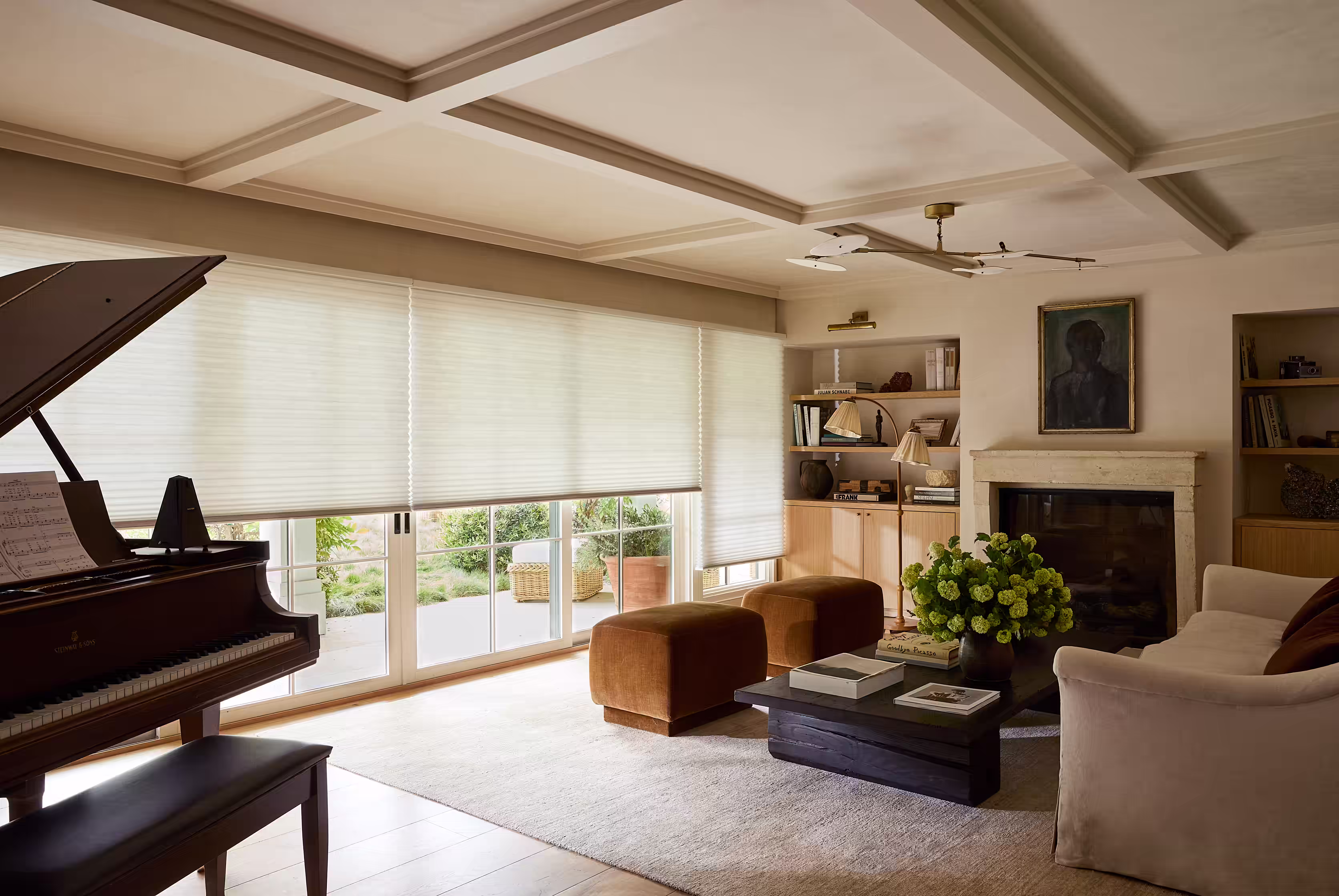 Designer Roman Shades absorbing sound in a living room