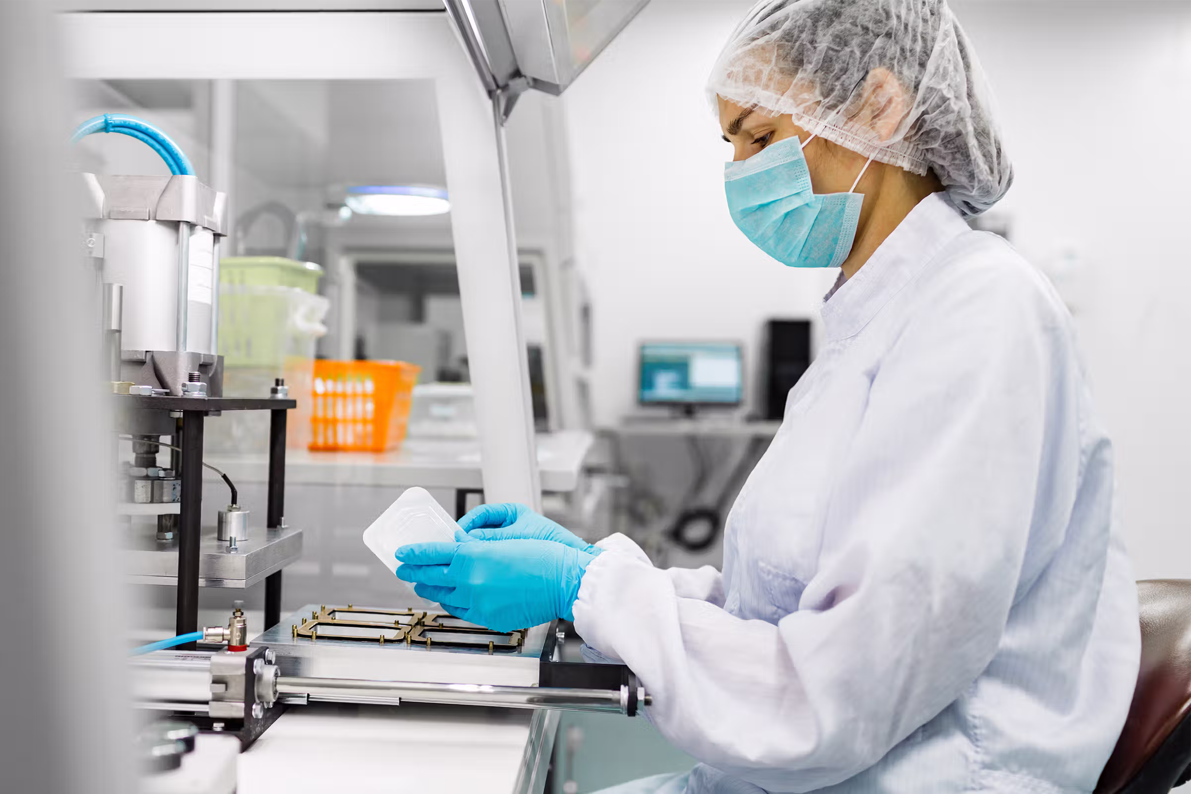 Pharmacy or laboratory workspace with controlled storage and clinical equipment in a regulated healthcare environment