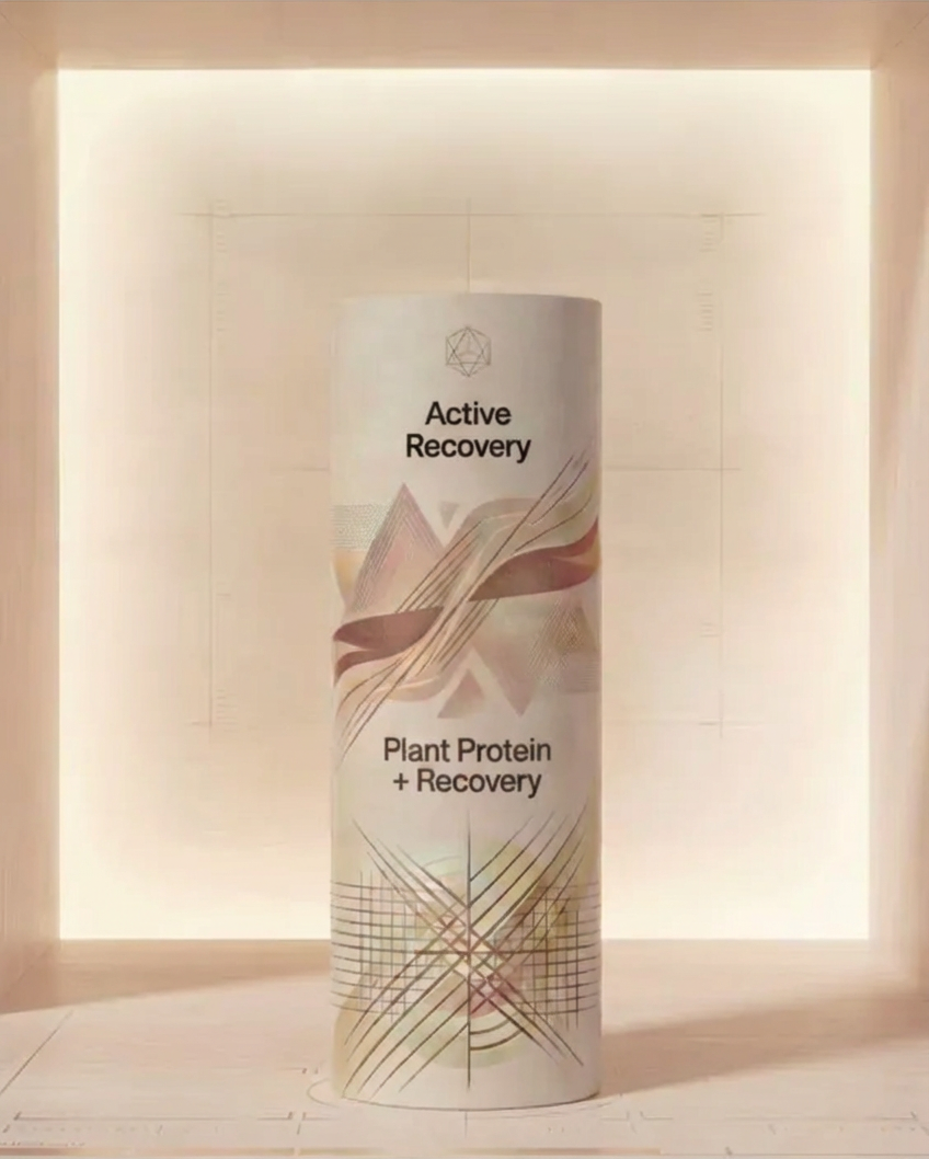 Cylindrical product container labeled Active Recovery Plant Protein + Recovery with abstract geometric designs.