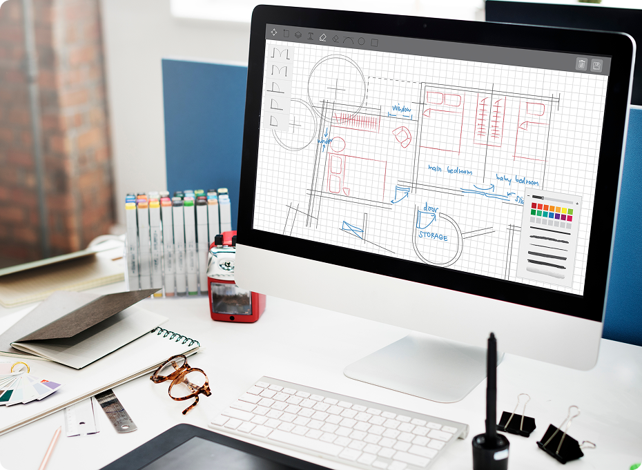 Arbeitsplatz mit CAD-Zeichnung auf zwei Bildschirmen