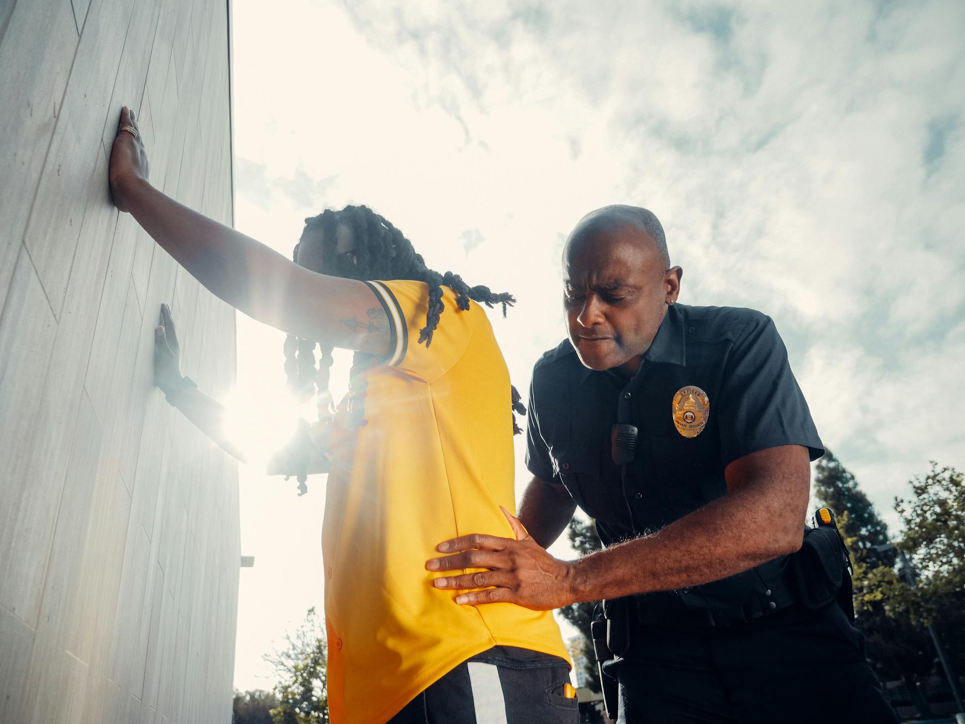 Officer conducting a welfare check in a detox observation housing unit