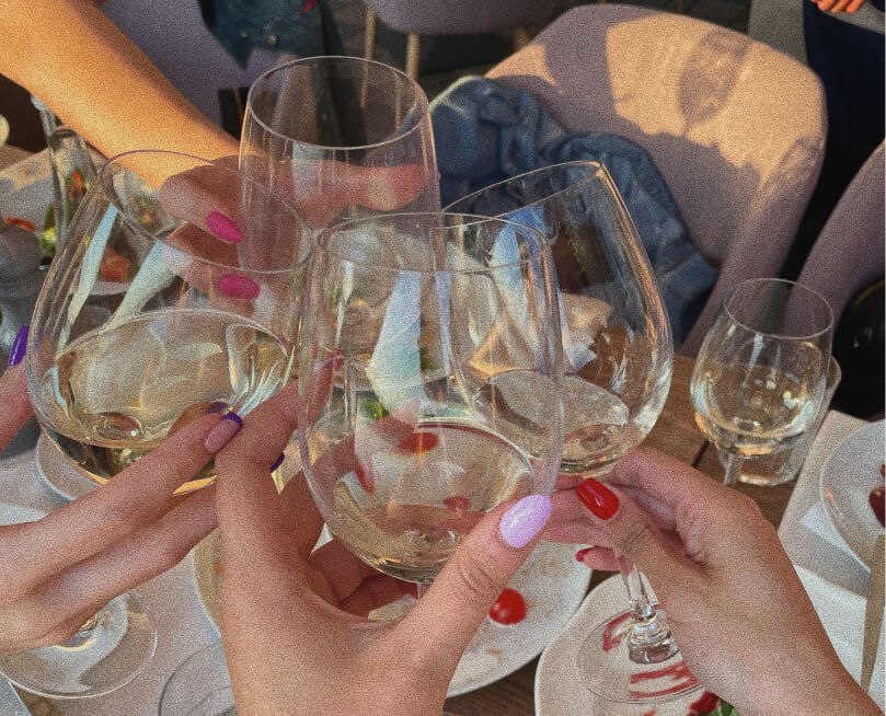 Chardonnay glasses clinking