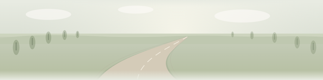 A long winding road through an open landscape, symbolizing sustained effort over time.