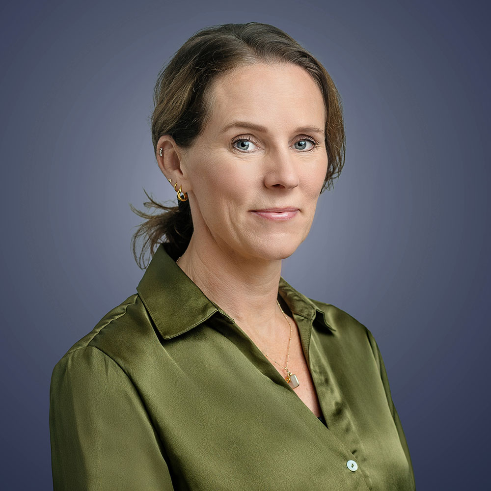 A headshot of Sonia Davies, of OSMO Partners