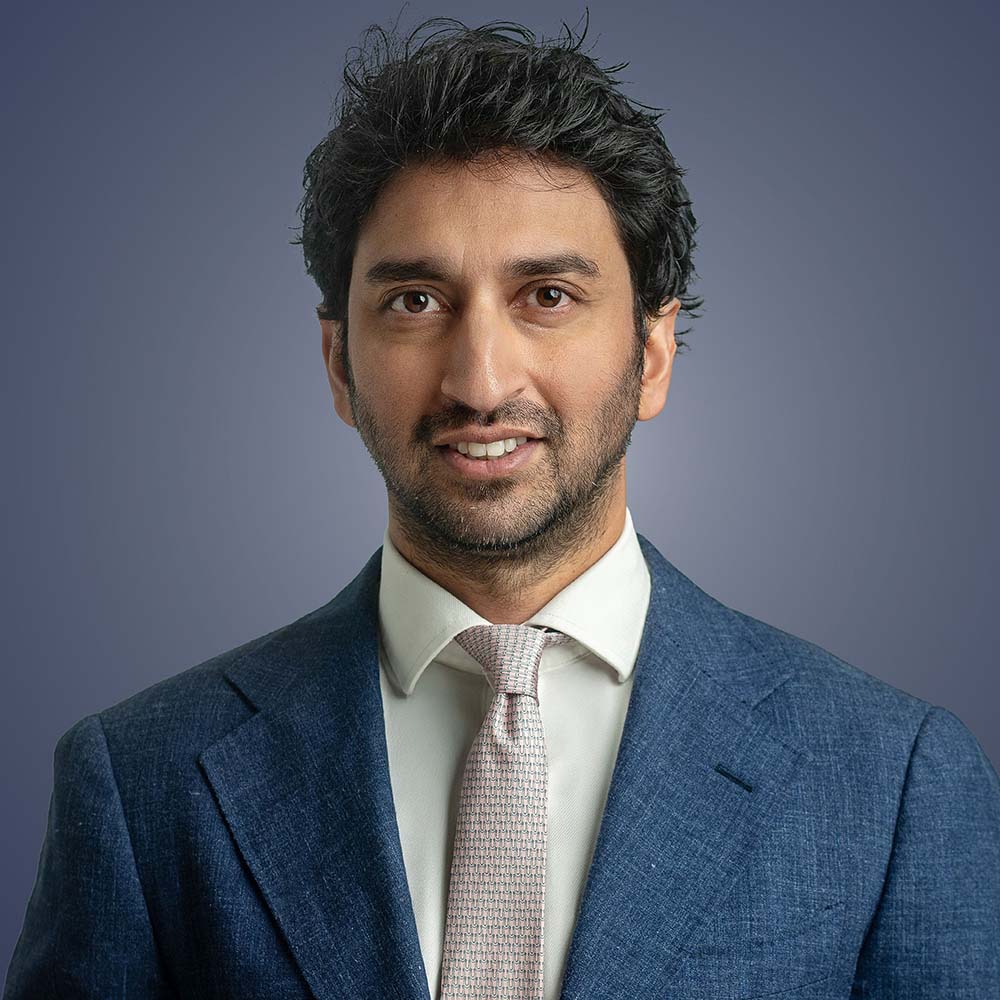 A headshot of Ricco Rodrigues, of OSMO Partners