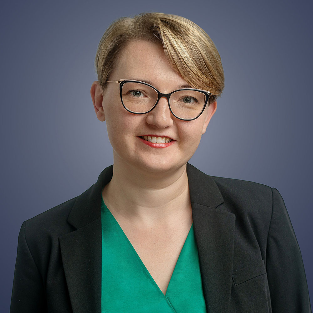 A headshot of Kasia Fronczuk, of OSMO Partners