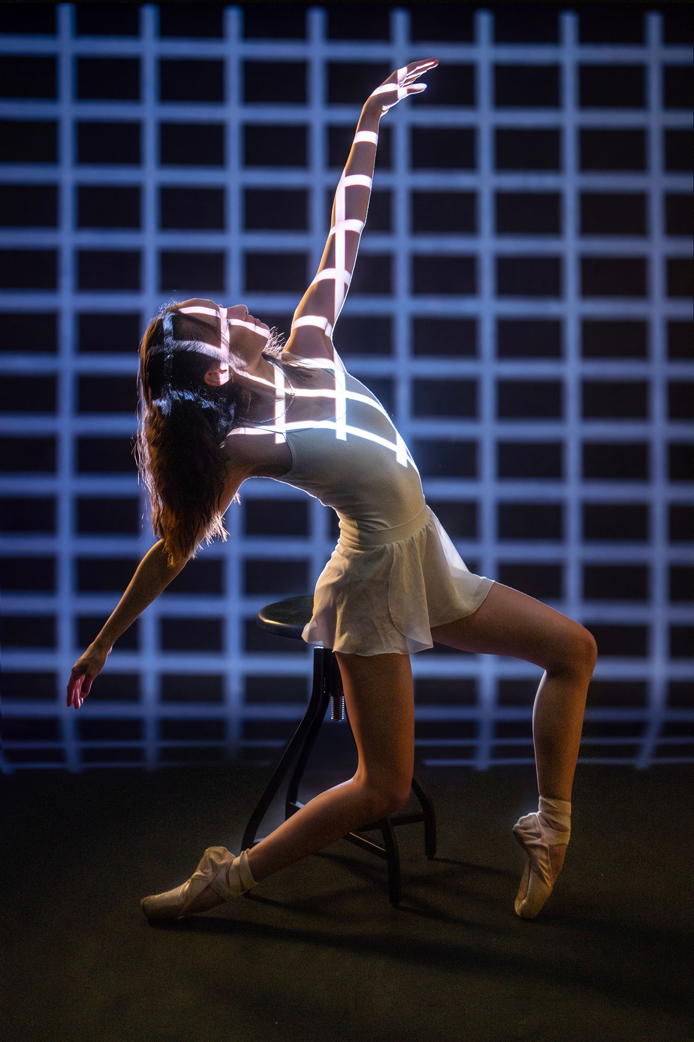 Andreina with geometric light projections during Open Set IV