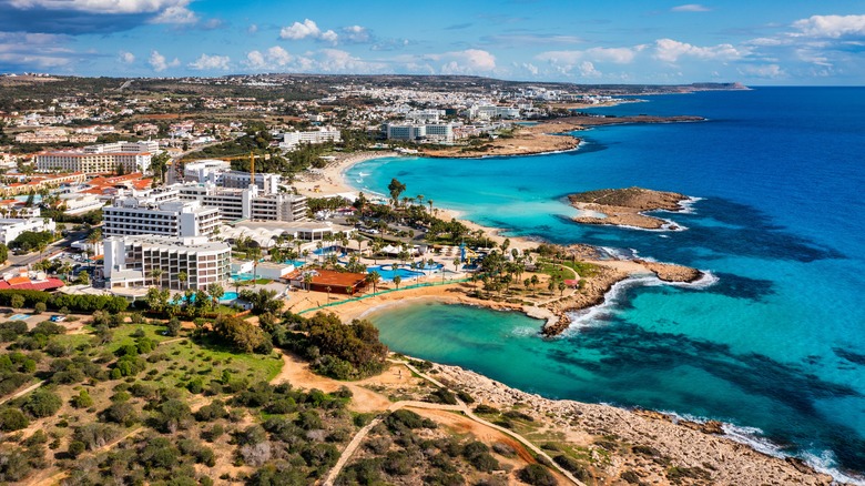 Scenic cityscape of a Cypriot business district representing its strategic location between Europe, Asia, and Africa.