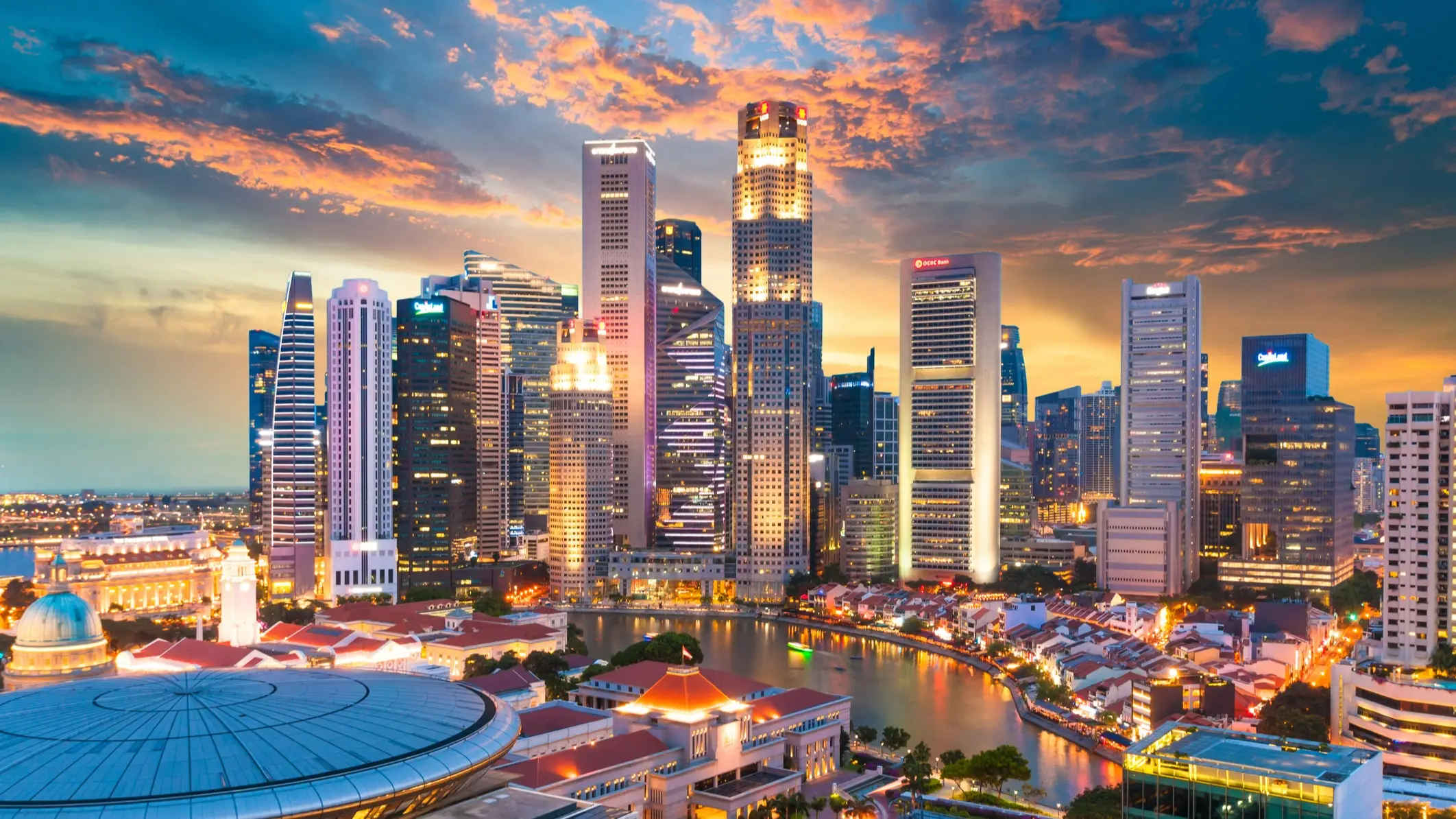 Scenic cityscape of a Singaporean business district representing its strategic location, political stability, and advanced digital infrastructure.