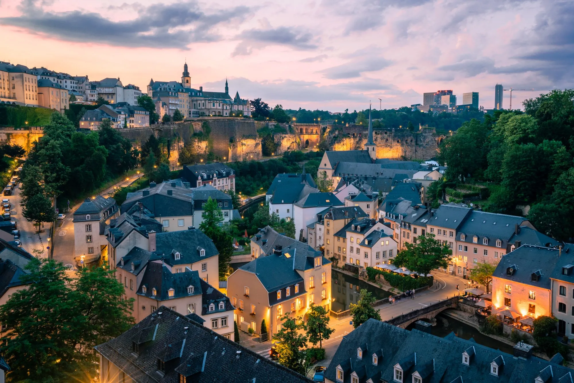 Panoramic view of Luxembourg City and the Alzette River representing its status as a premier global hub for private banking and institutional finance.