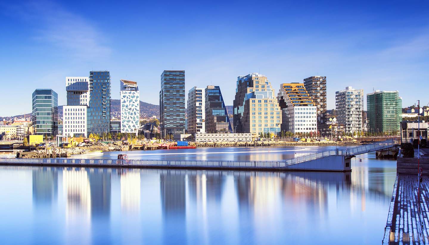 Professional view of a modern Norwegian workspace illustrating the tax efficiency and highly skilled talent pool available for maritime and tech sectors.