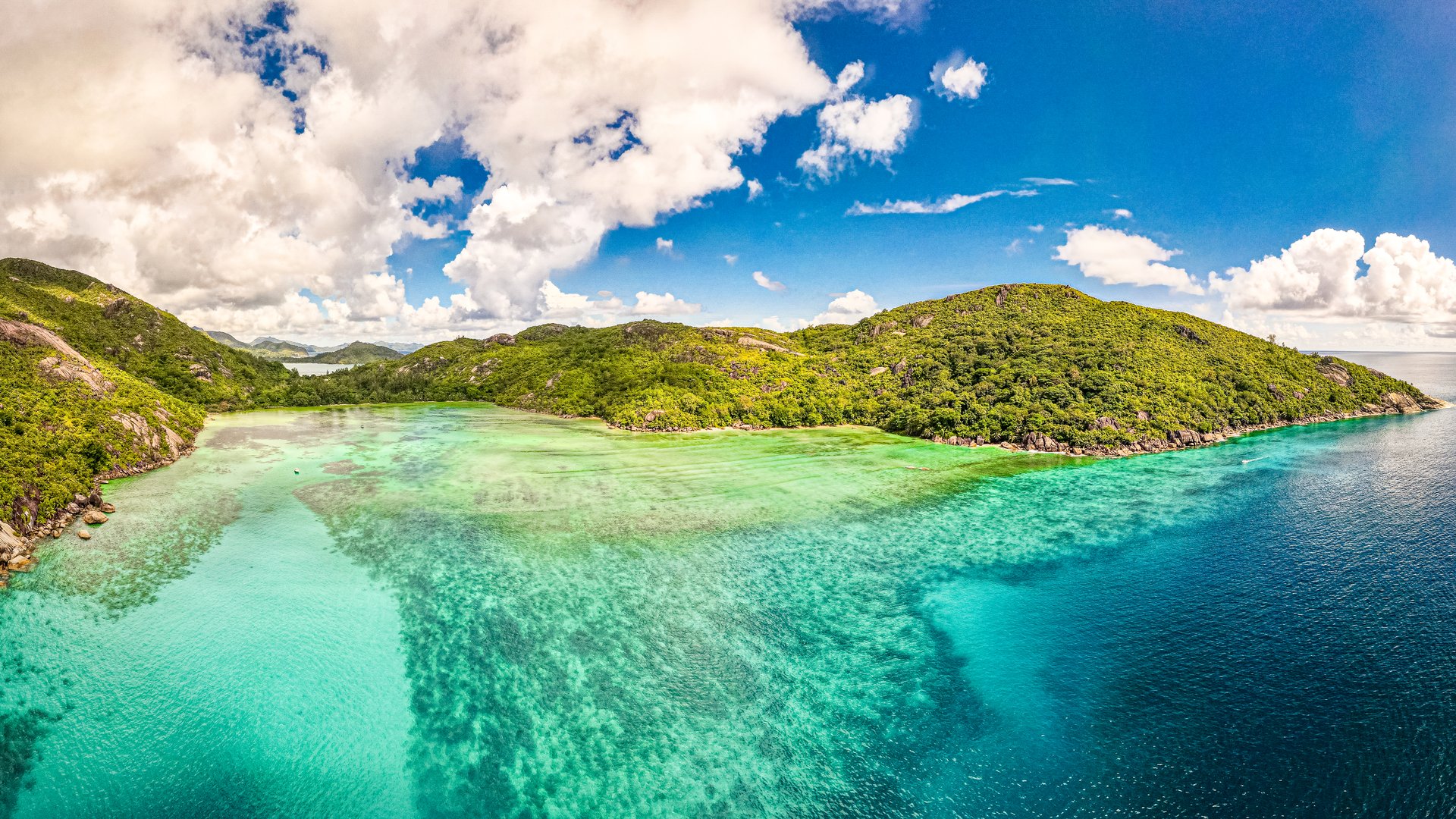 Luxury beachfront architecture in Seychelles highlighting the tropical lifestyle and investment potential for international entrepreneurs.