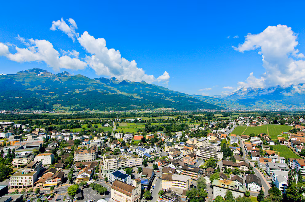 Scenic alpine landscape of Liechtenstein representing its strategic location between Switzerland and Austria and its status as a neutral jurisdiction.