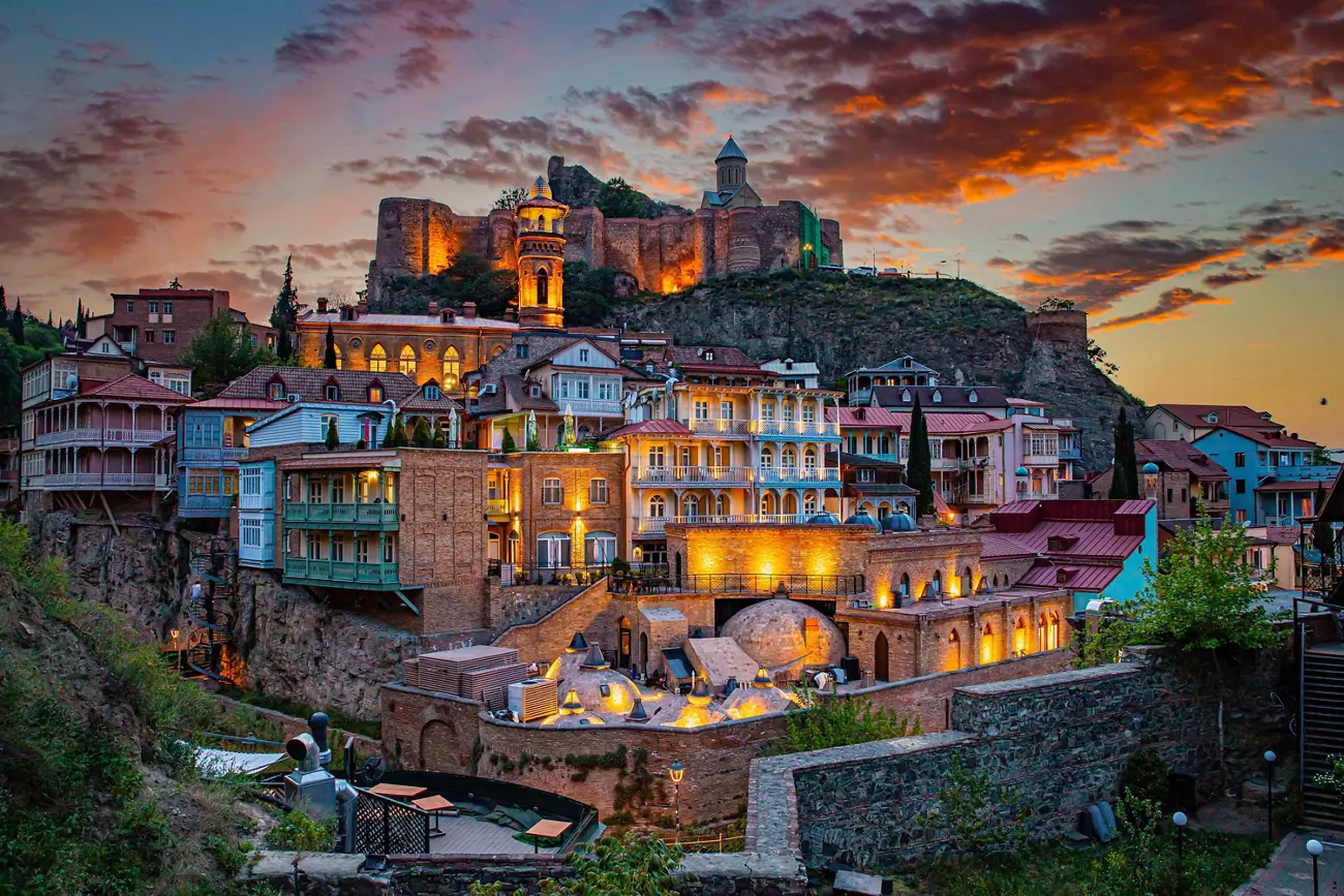 Panoramic view of the Tbilisi skyline in Georgia representing its status as a highly business-friendly and low-tax hub for entrepreneurs.