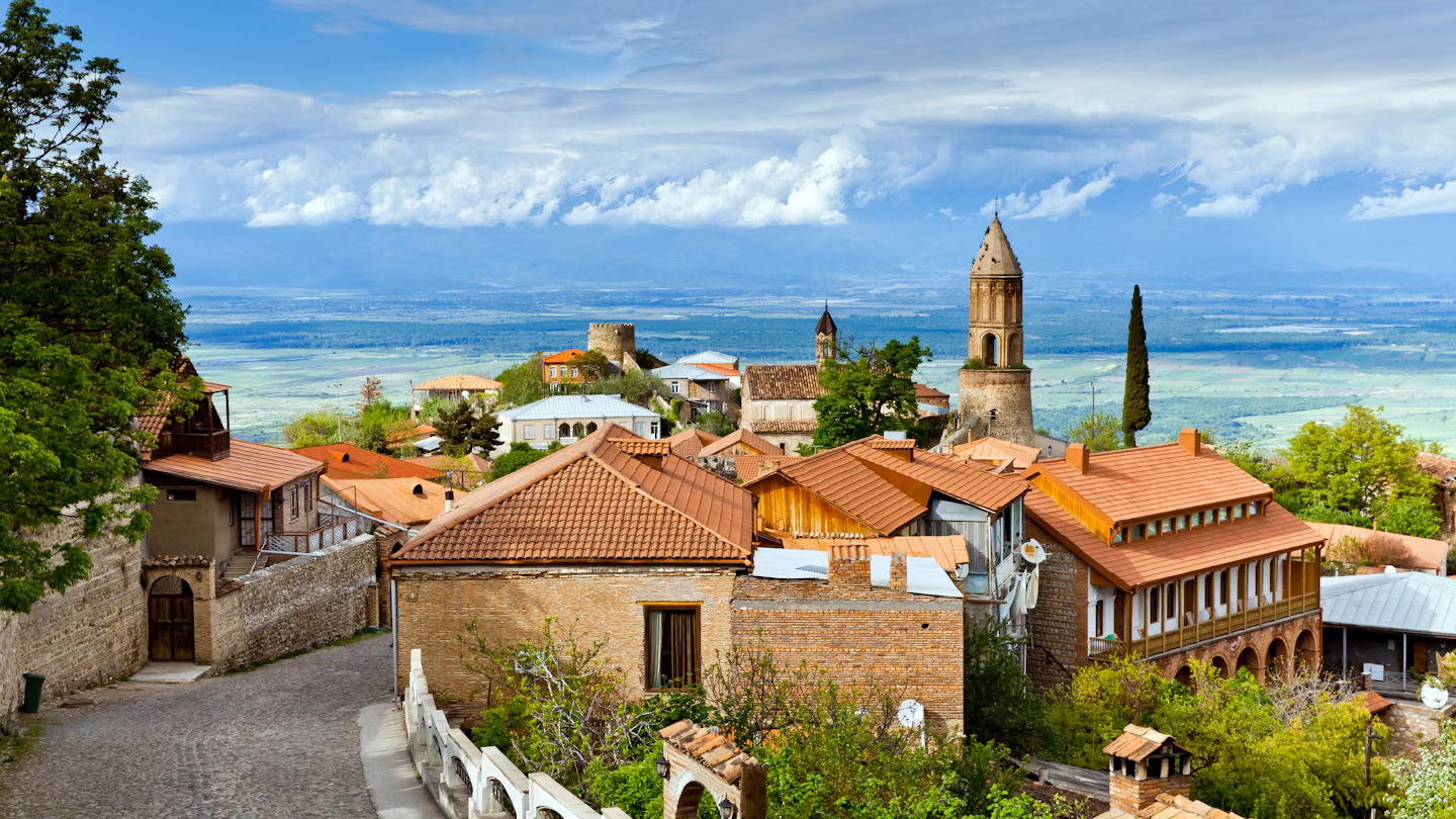 Professional view of a modern Georgian workspace illustrating the tax efficiency and competitive operating costs available for international trading.