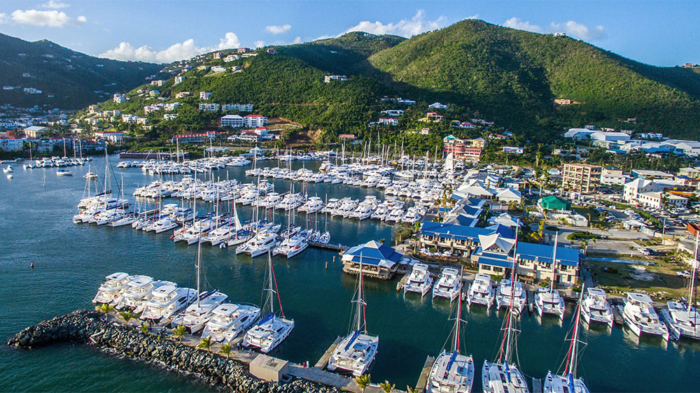 Scenic view of the BVI coastline and turquoise waters representing its strategic Caribbean location and stable British Overseas Territory status.