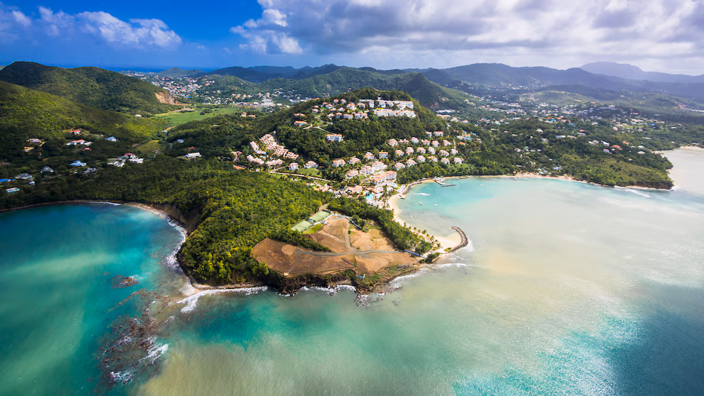 Scenic view of the St Lucia coastline reflecting the investment potential and tropical lifestyle for international CBI applicants.