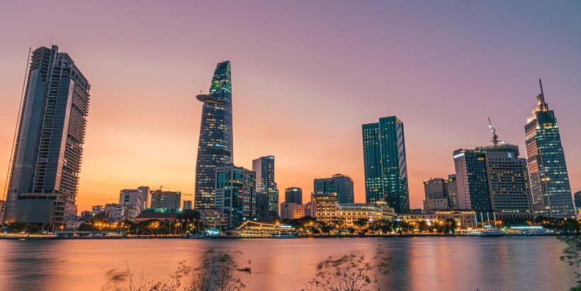 Professional view of a modern Vietnamese workspace illustrating the competitive operating costs and skilled talent pool available for regional operations.