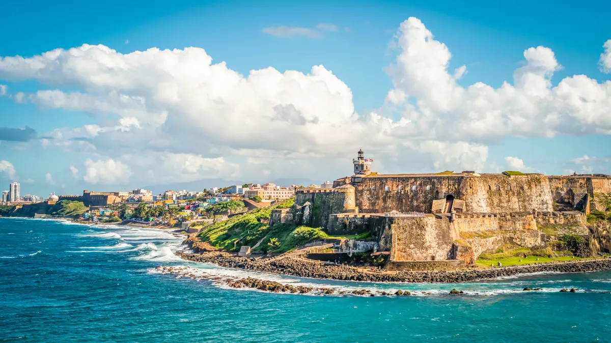 Panoramic coastal landscape of Puerto Rico illustrating the benefits of bona fide residency for US citizens and service exporters.