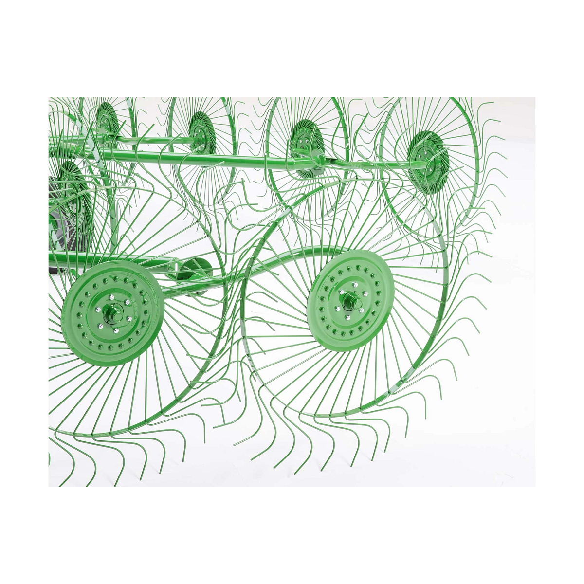 Studio close-up of the green circular rakes that comprise a WR00 Wheel Rake