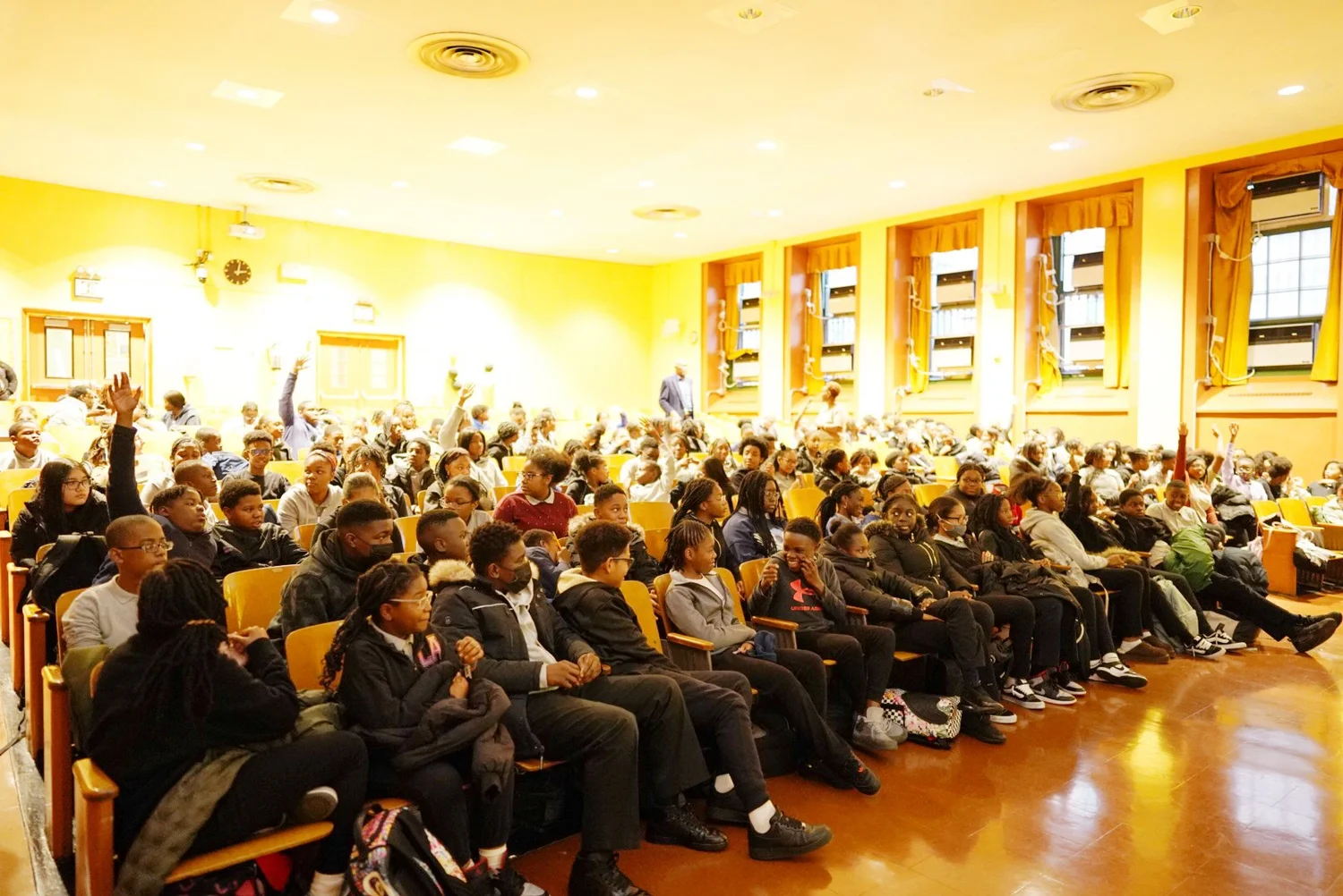 Large group of students seated in an auditorium