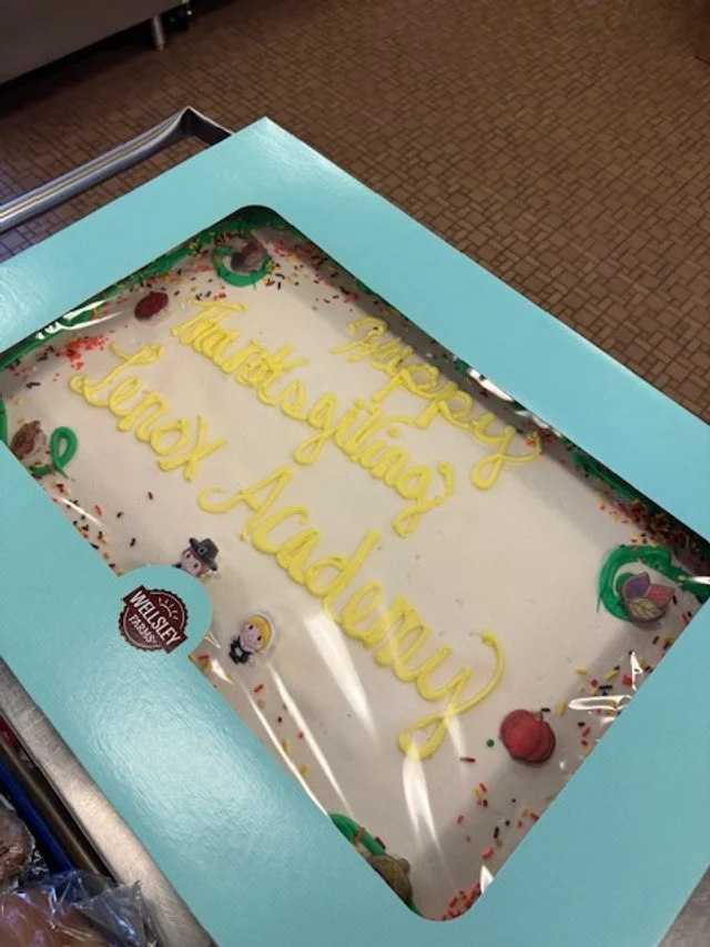 Holiday cake with white frosting decorated
