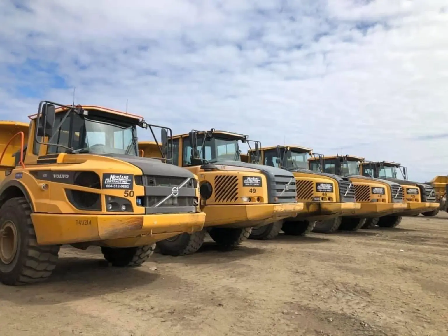 Norlang Contracting articulated rock truck fleet lineup