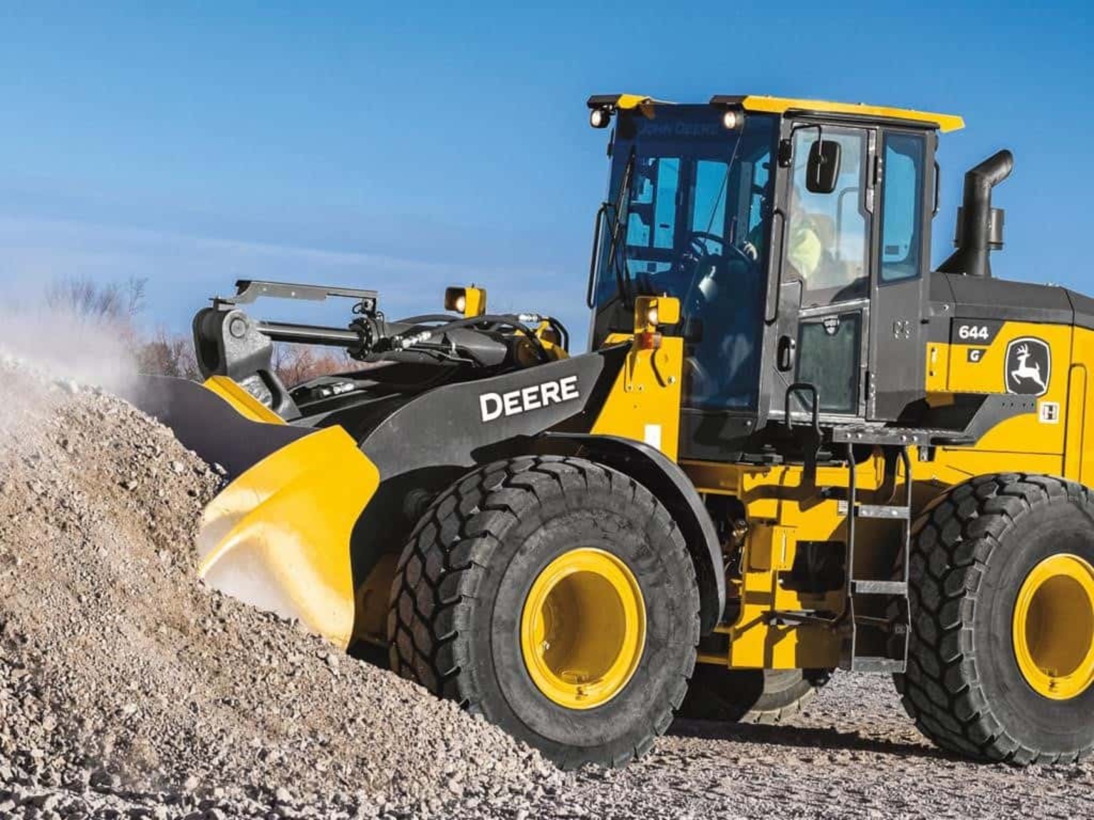John Deere 644 G-Tier wheel loader working in aggregate