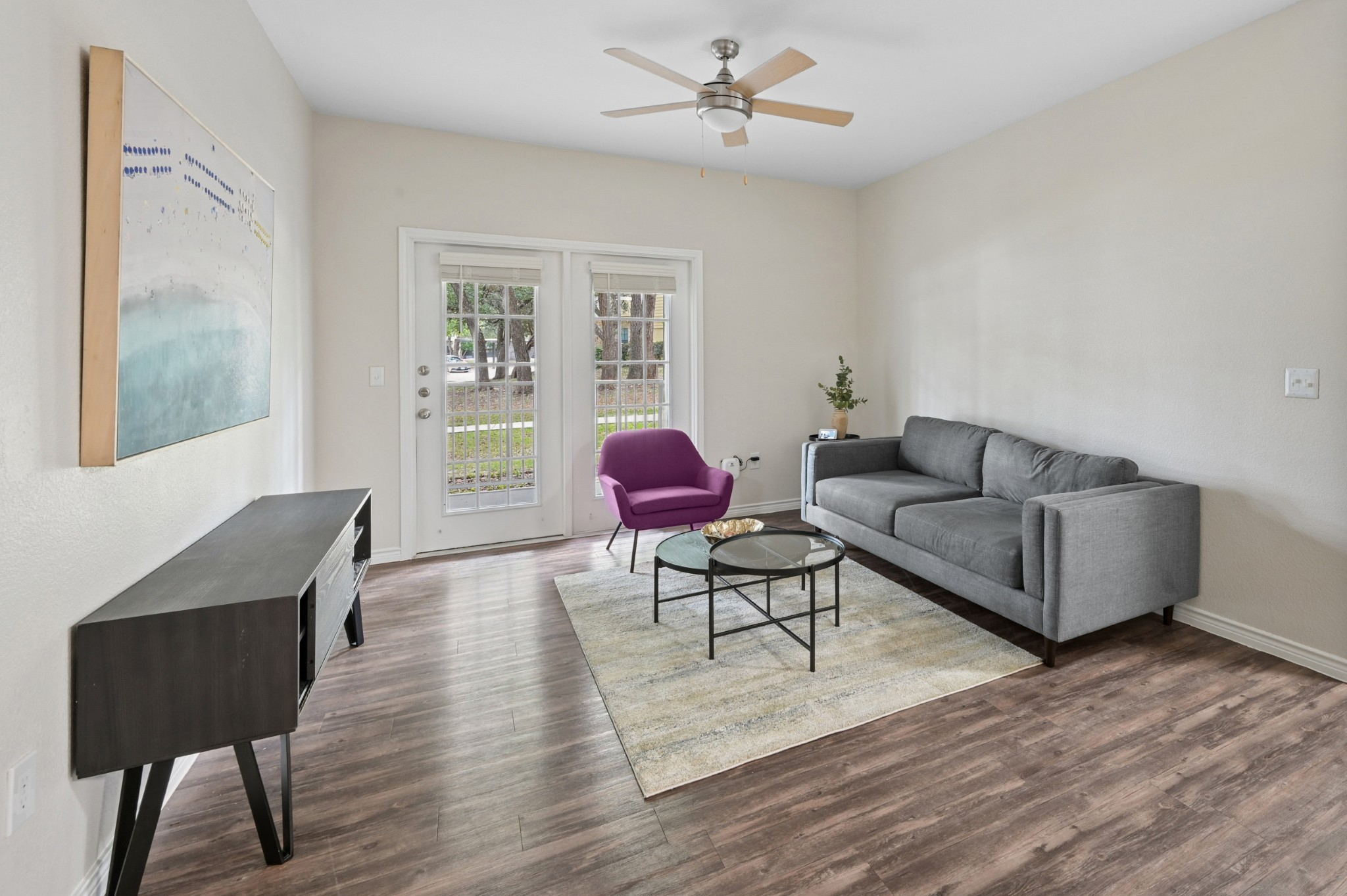 View of the living room and french doors to the patio