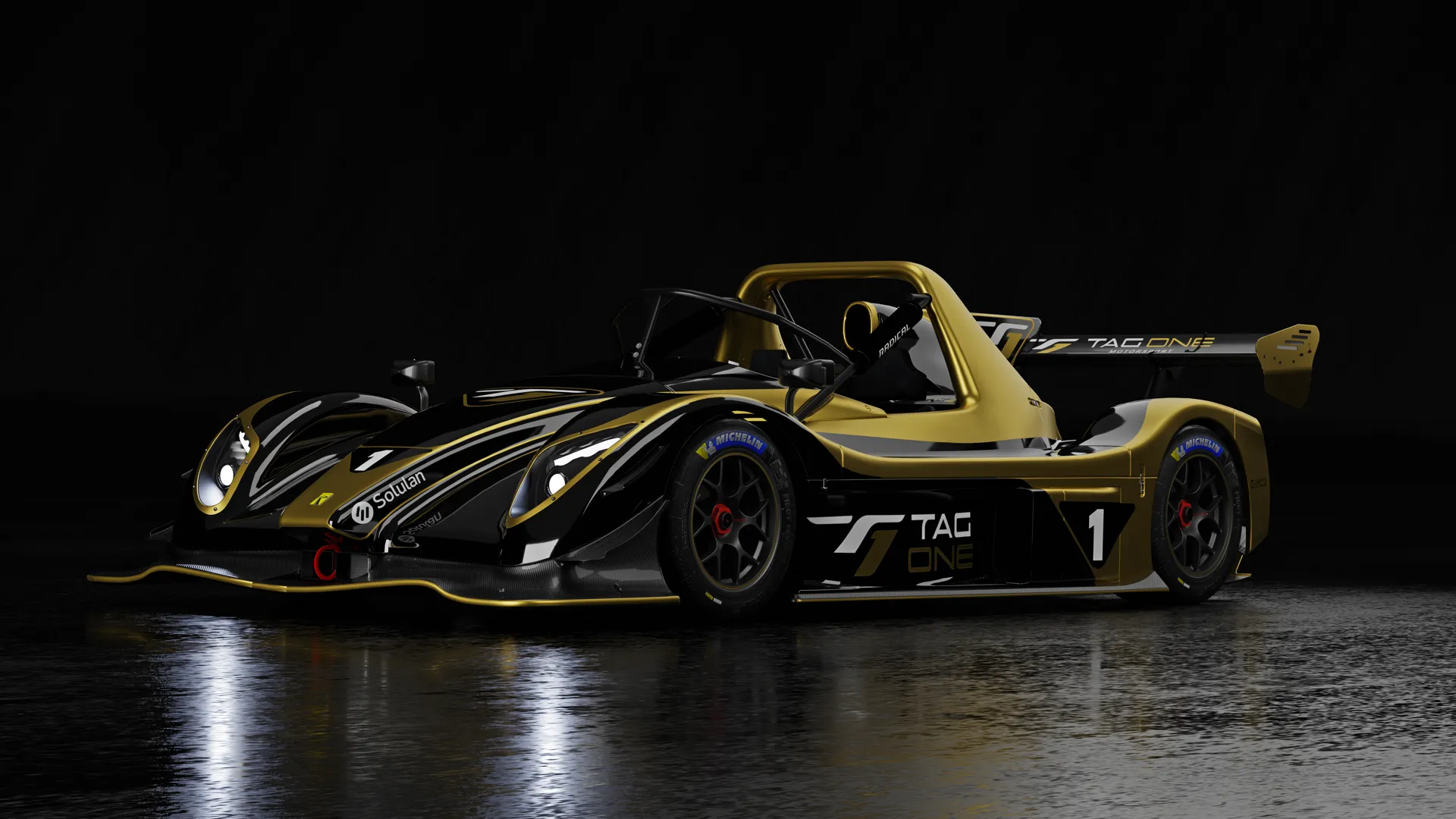 Radical SR3 XXR Tag One Motorsport — voiture de course dorée et noire vue de face