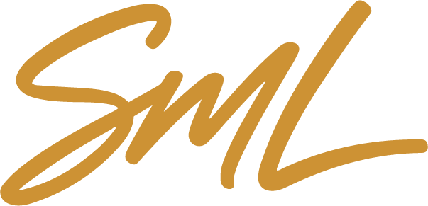 Stylized golden-yellow script letters 'Sml' on a transparent background.