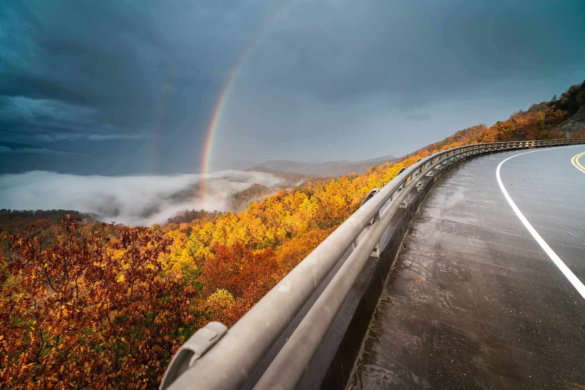 Photo of a rainbow over the Smoky Mountains from the newly-finished Foothills Parkway extension.
