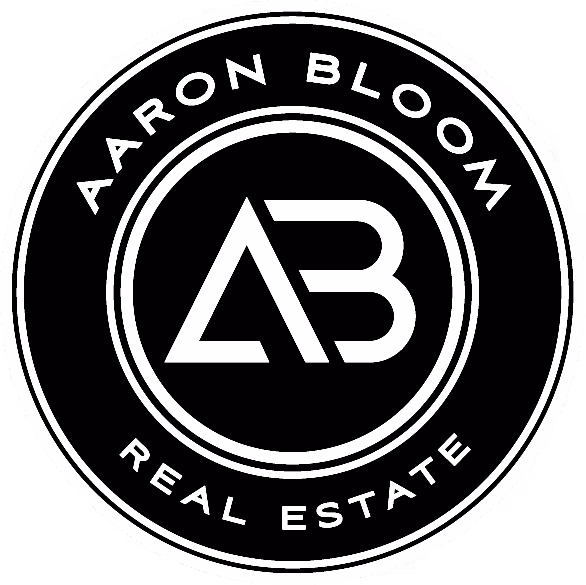 Aaron Bloom Real Estate logo with stylized letters AB inside concentric circles.