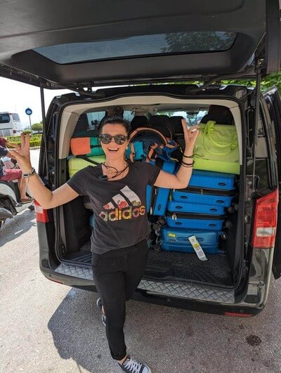 Get Corfu Transfer driver arranging suitcases