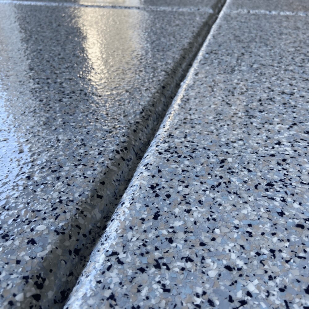 Commercial professional flake epoxy floor by Lifetime Coatings in Utah