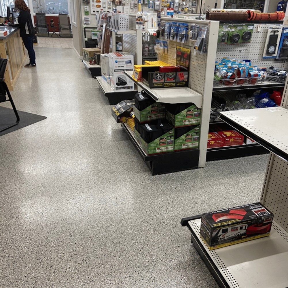 Commercial flake epoxy floor in a retail space by Lifetime Coatings in Utah