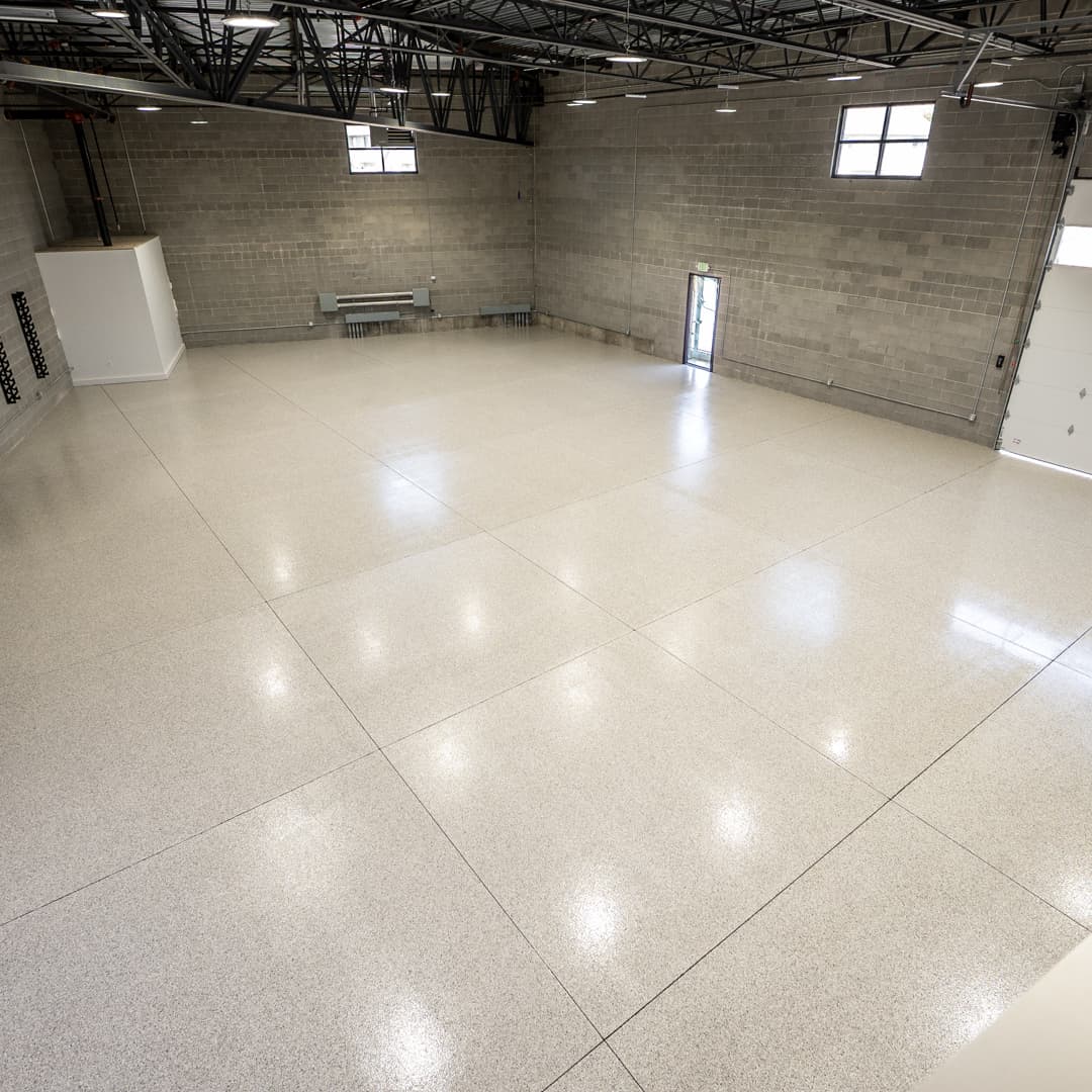 Fallout flake epoxy garage floor by Lifetime Coatings