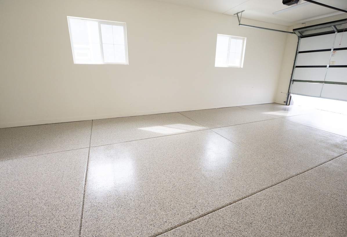 Fallout flake epoxy garage floor by Lifetime Coatings