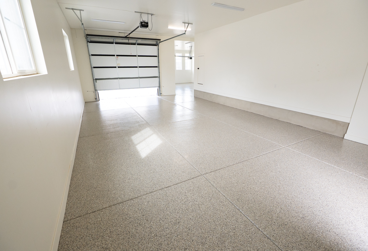 Fallout flake epoxy garage floor by Lifetime Coatings
