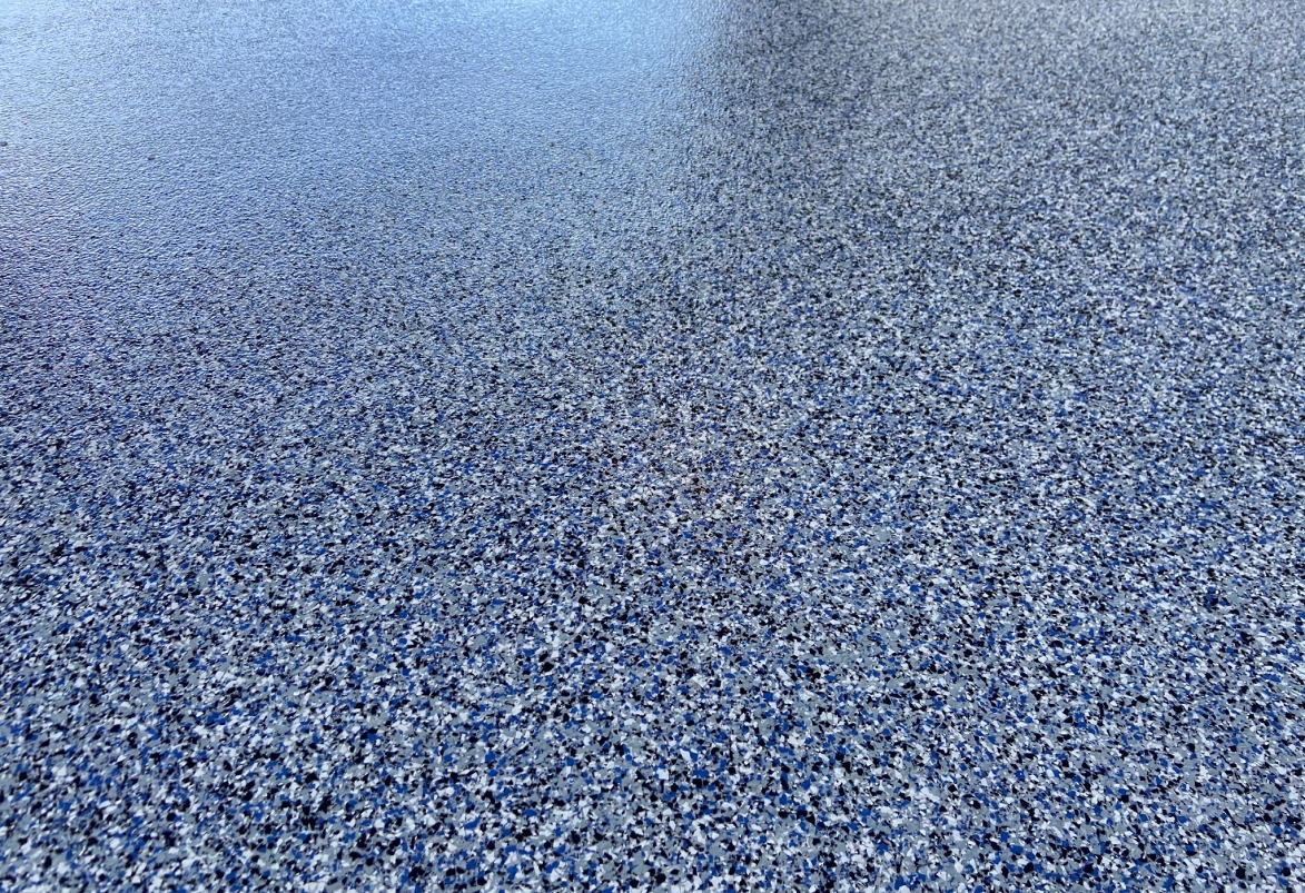 Nautical flake epoxy garage floor by Lifetime Coatings
