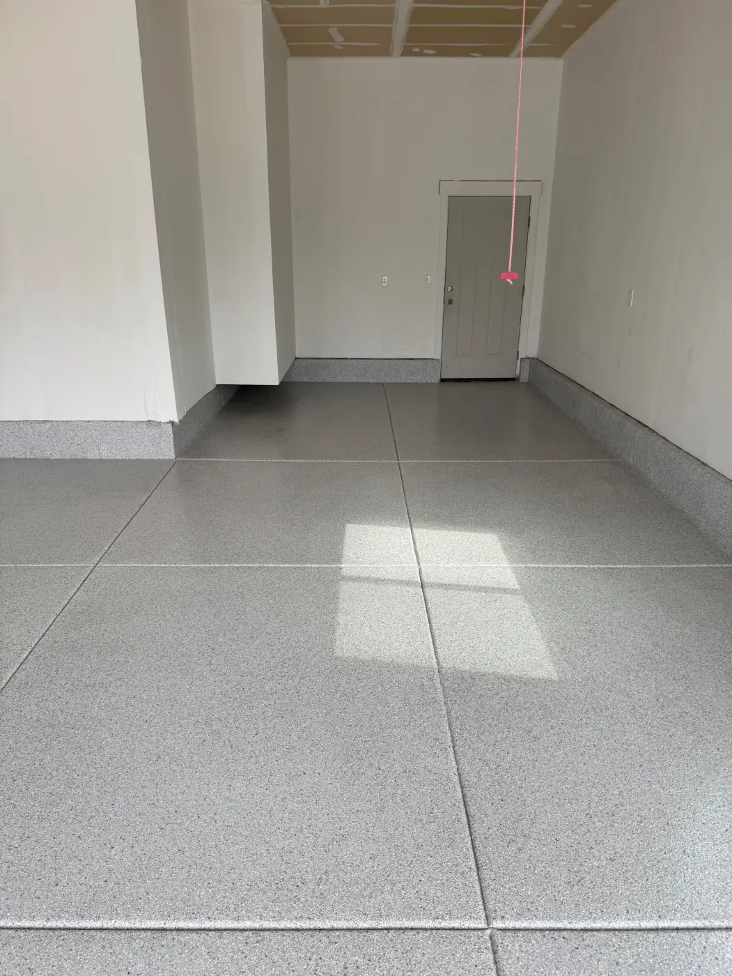 Frost flake epoxy garage floor by Lifetime Coatings