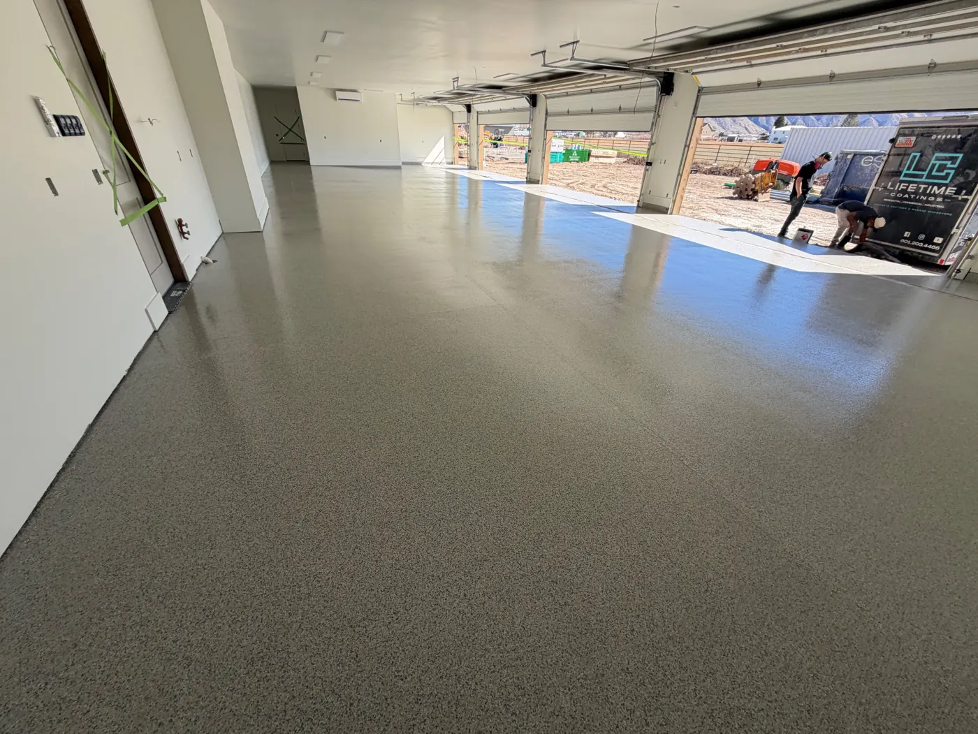 Ashton flake epoxy garage floor by Lifetime Coatings